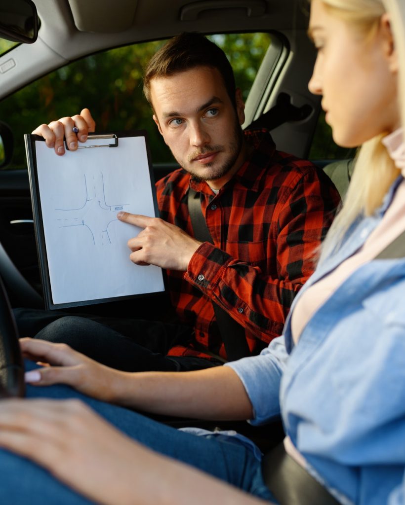 woman-and-man-with-checklist-driving-school-1.jpg